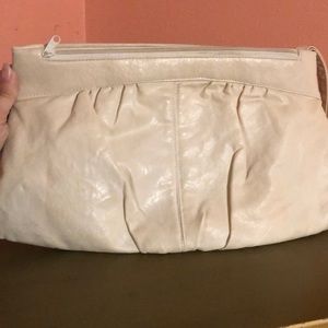 Cream wristlet with 2 zippered pouches